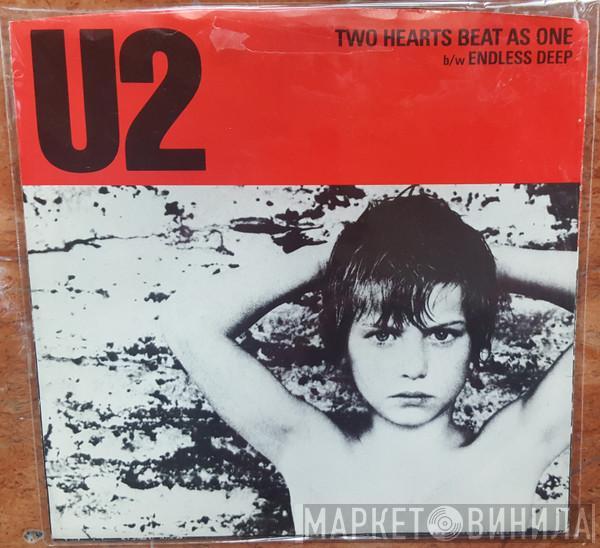 U2  - Two Hearts Beat As One
