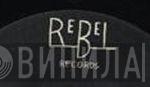 Rebel Records - Винил CD и Кассеты лейбла Rebel Records на сайте МаркетВинила